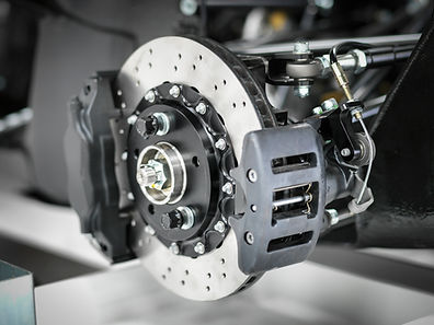 Close-up view of car brakes due for a service.