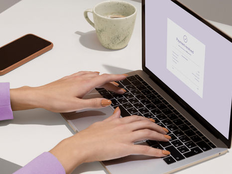 Woman typing on laptop