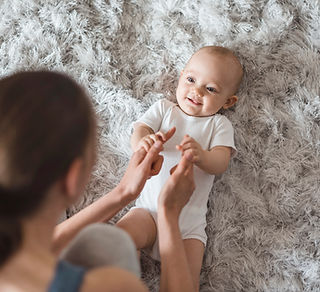 Mother Playing with Baby