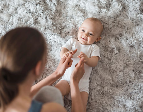 Mother Playing with Baby