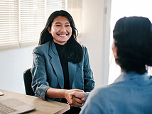 Two people shaking hands