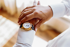 man with a watch on his arm