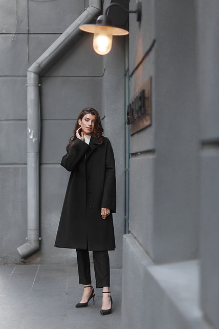Woman in black coat