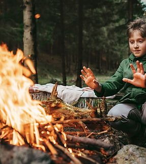Boy by Campfire