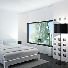 A modern minimalist bedroom with white walls and a large garden window