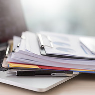 Laptop and Paperwork