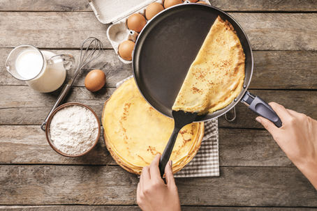 picture shows a cast iron and crepes, picture shows bliny that can be made for Maslenitsa