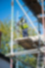 scaffolder on house roof