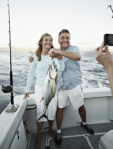 Couple Holding Fish