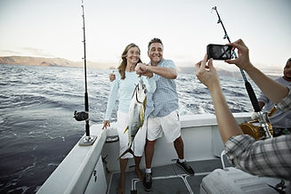 Couple Holding Fish