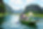 Tourists taking a selfie on a boat in Ngo Dong river, Ninh Binh, Vietnam