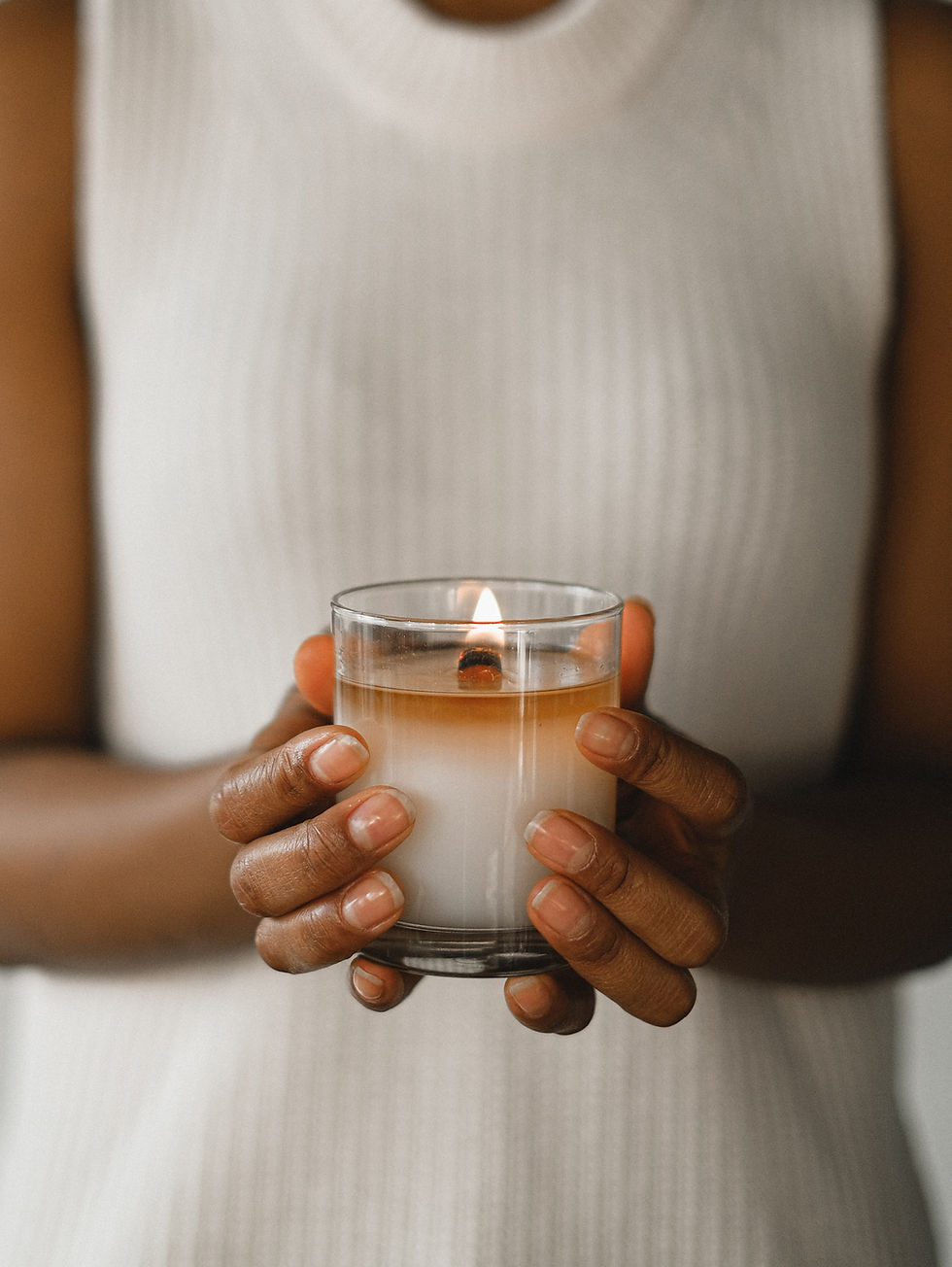 Holding Glass Candle
