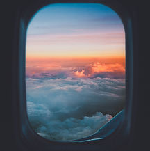 Airplane Window Sunset View