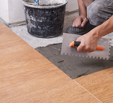 Adhésif à plancher pour carrelage
