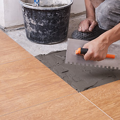 Adhésif à plancher pour carrelage