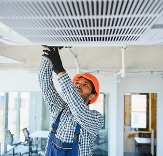 HVAC Technician Working