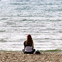 Woman Sitting Beach