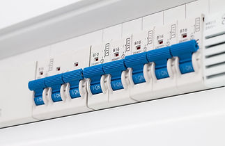 The electrical fuse box with blue switches