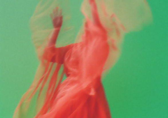 Blurred Red Dress Movement