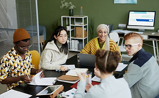 Diverse group of people at a team collaboration meeting