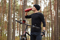 Athlete hydrating while also using the hydration plus IV