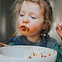 Child Eating Spaghetti
