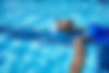 Woman Floating in Pool