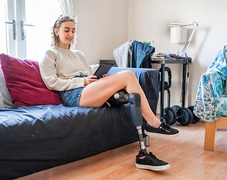 amputee using a tablet in their home