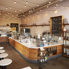 Cozy café with comfortable seating and a warm, inviting atmosphere.