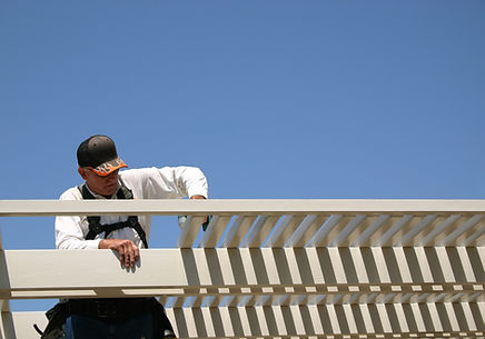 Man Building Patio Awning