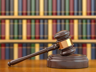 Concept of justice. Gavel and law books