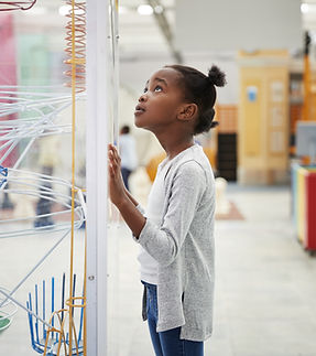 Girl Observing Display