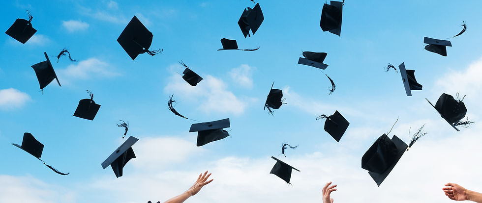 Graduation Hats Flying