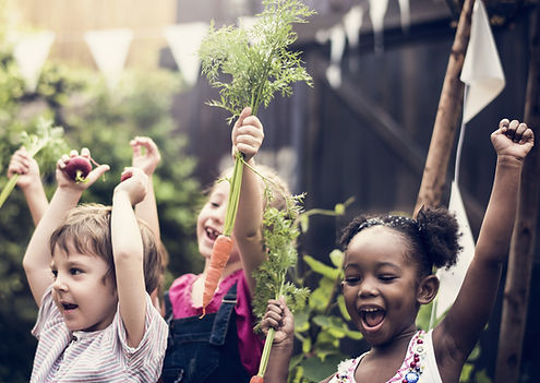 Happy kids in vegetable farm