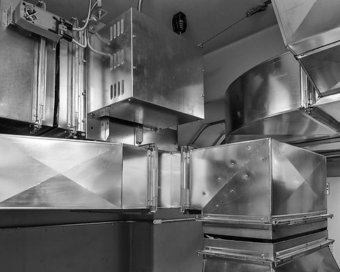 Grayscale HVAC ductwork with a damper actuator for airflow control in an air conditioned space