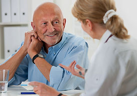 A GP and patient reviewing a personalised medication plan with a focus on improving function, participation and quality of life.
