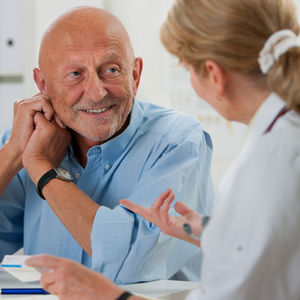 Doctor consulting a new patient