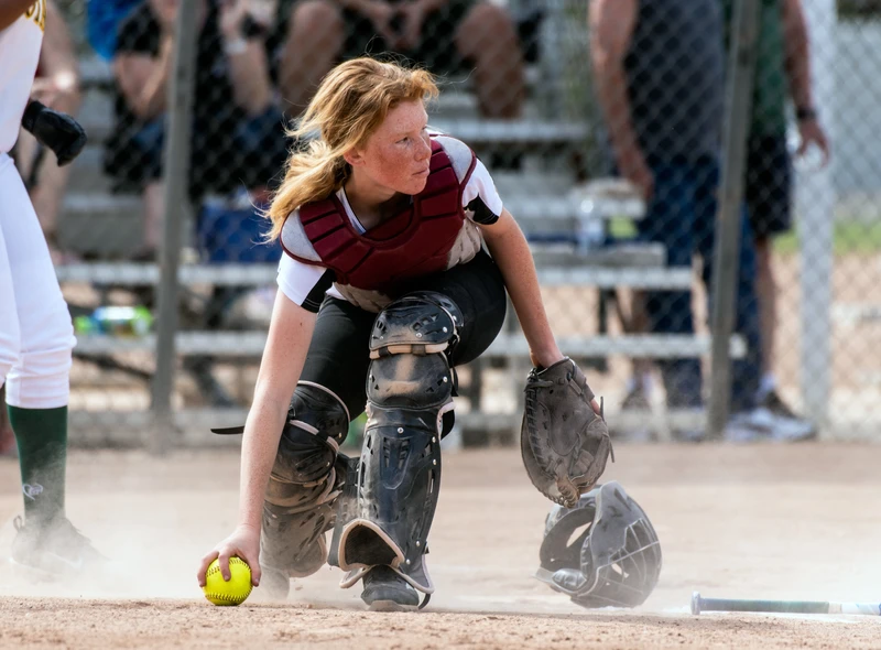 High Achiever, Student athlete who is working hard to pick up the ball.