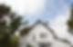 house exterior with white rendered applied