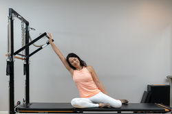 Woman Practicing Pilates