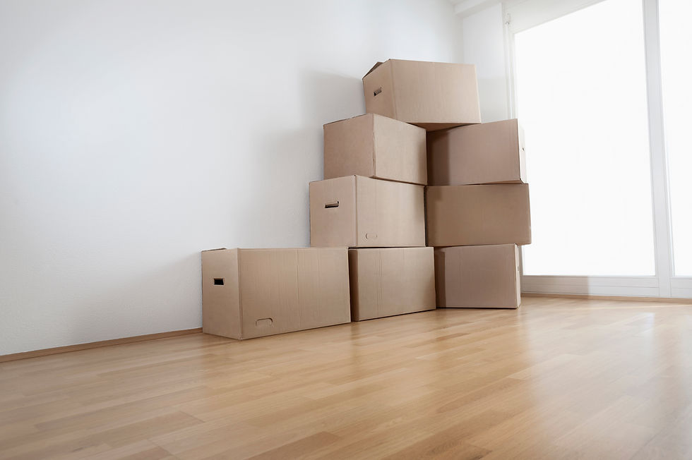 Stack of cardboard boxes in a room