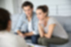 Couple meeting architect for house construction