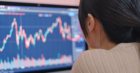 Person Analyzing Graphs On Screen