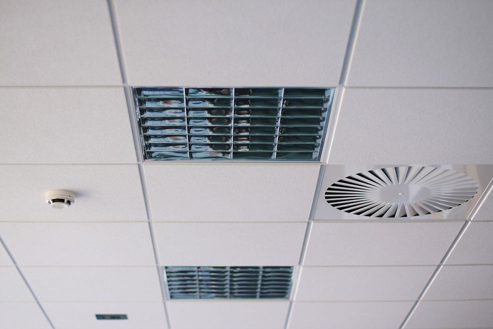 "Office ceiling with air duct, fire detector and lamps