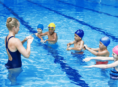 Swimming Trainer with Students