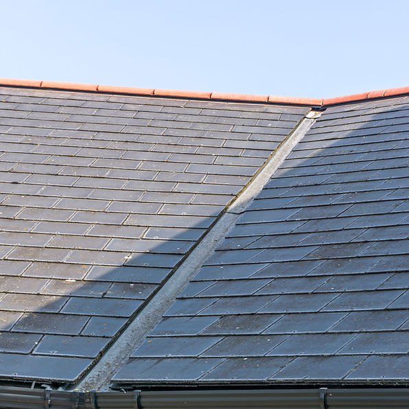 View of a roof showing the lead valley and roof slates