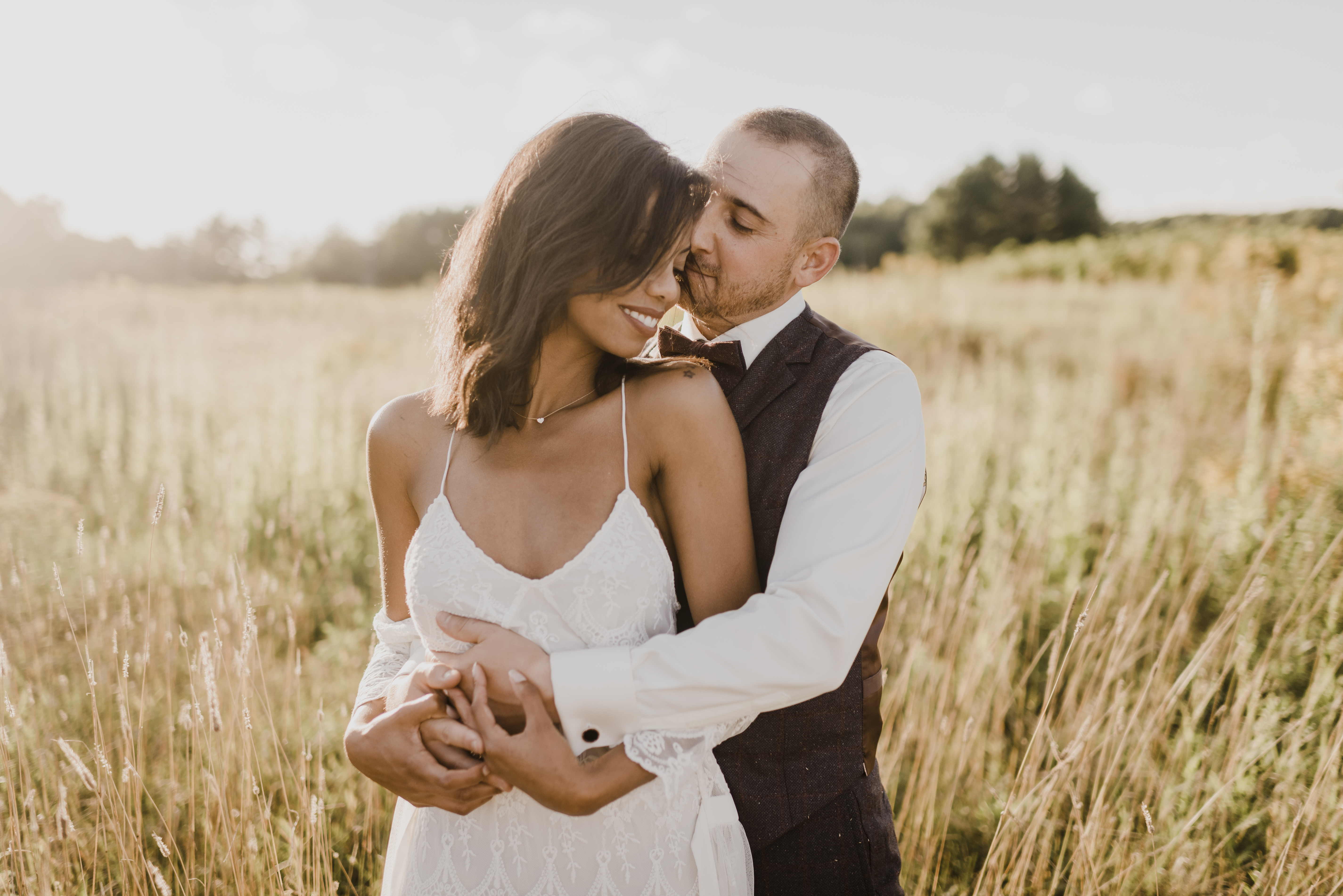 Couple in sunny field