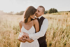 Couple in sunny field
