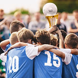 Team Holding Trophy