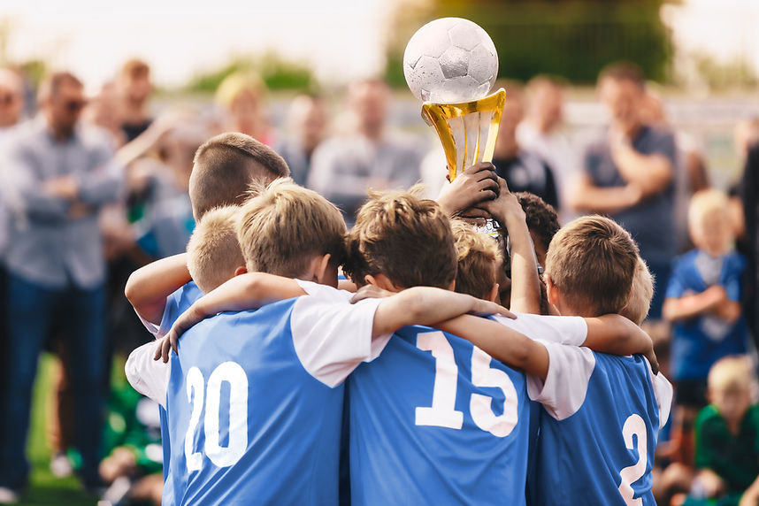 Team Holding Trophy